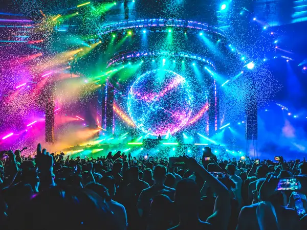 City Pulse: vivid blue and green lights above a crowded music venue