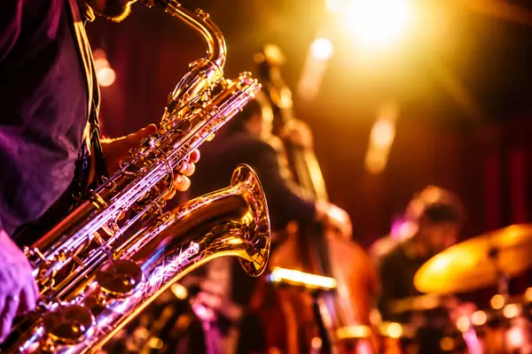 Jazz Night: a gleaming saxophone on a warmly lit stage